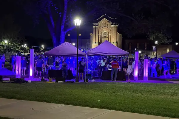 Outdoor festival production with speaker rental and LED uplighting